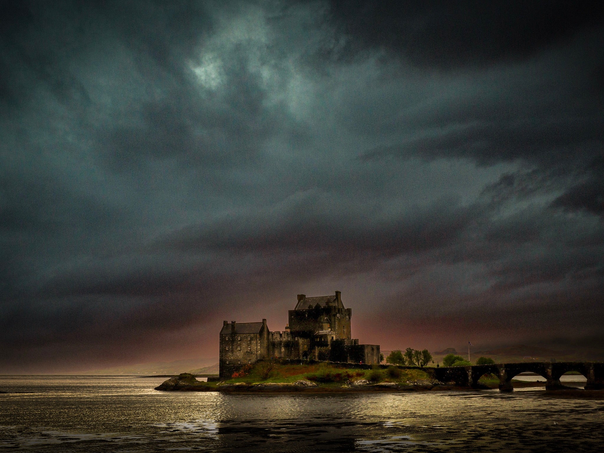 A Brooding Eilean Donan Castle Photography Prints