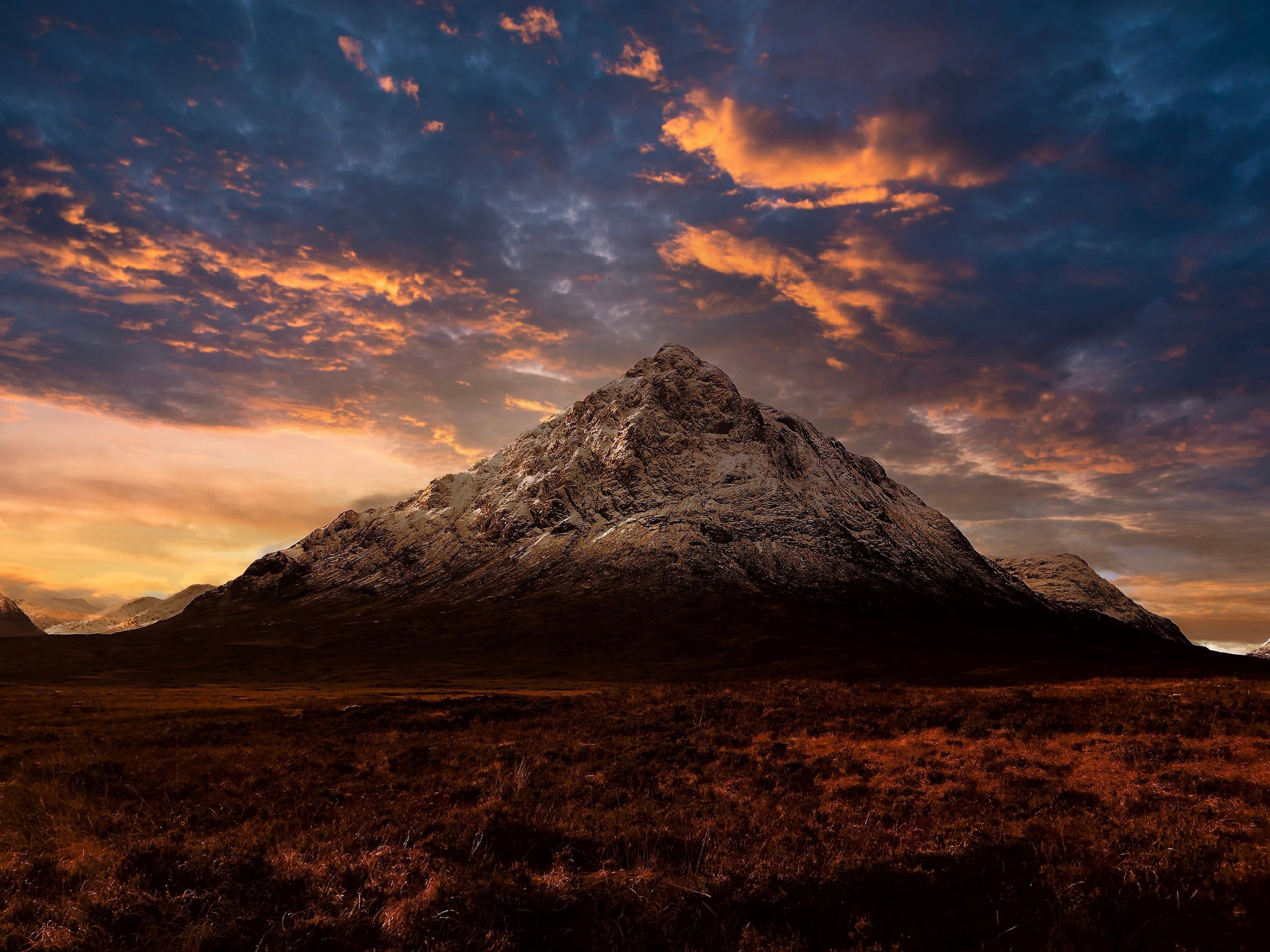 Snow-dusted mountain peak from Buachaille Etive Mor dusk photography for stunning dusk prints